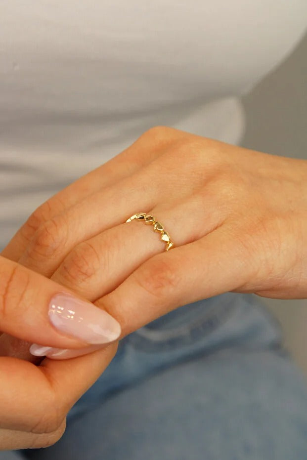 14 Carat Gold Row Heart Ring